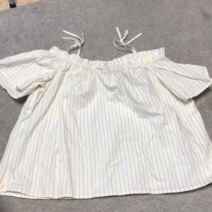 White blouse with blue and yellow stripes